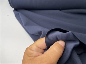 Polyester jersey - flot marine med creppet overflade